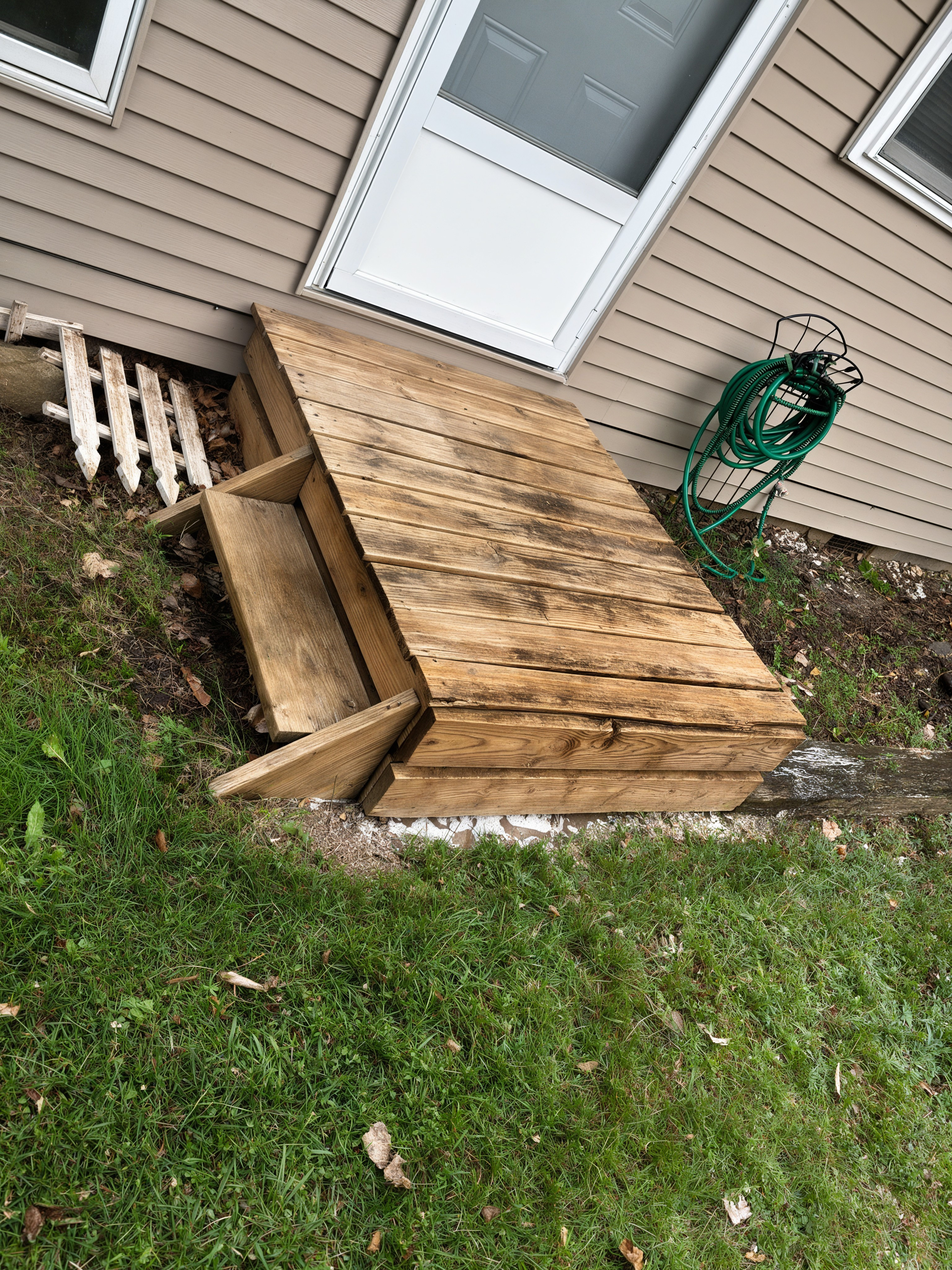 After: deck steps cleaned to bare wood